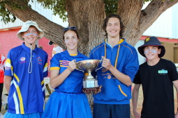 Atkins house captains holding athletics trophy